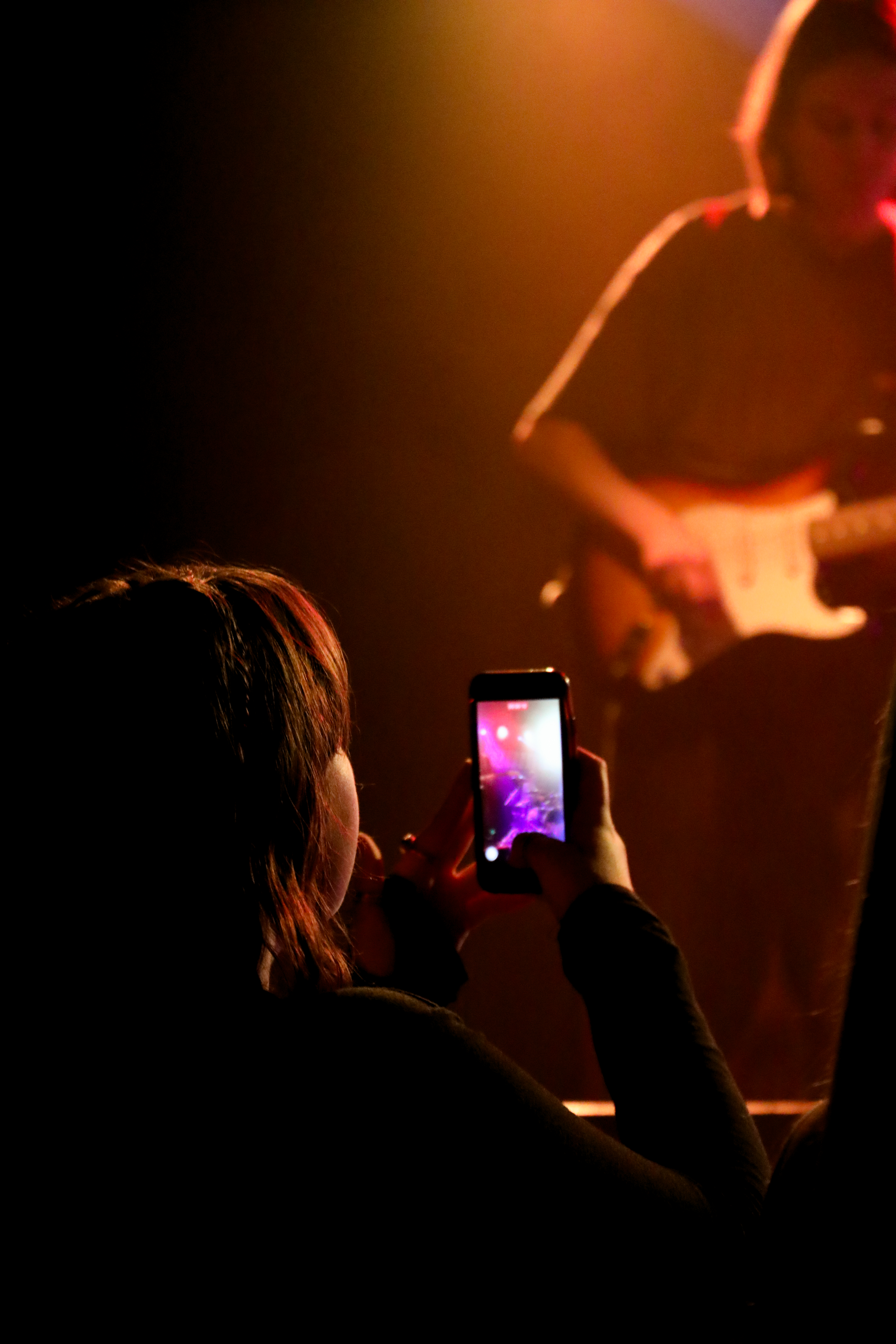 Gig-Photography-Girl-Holding-Phone